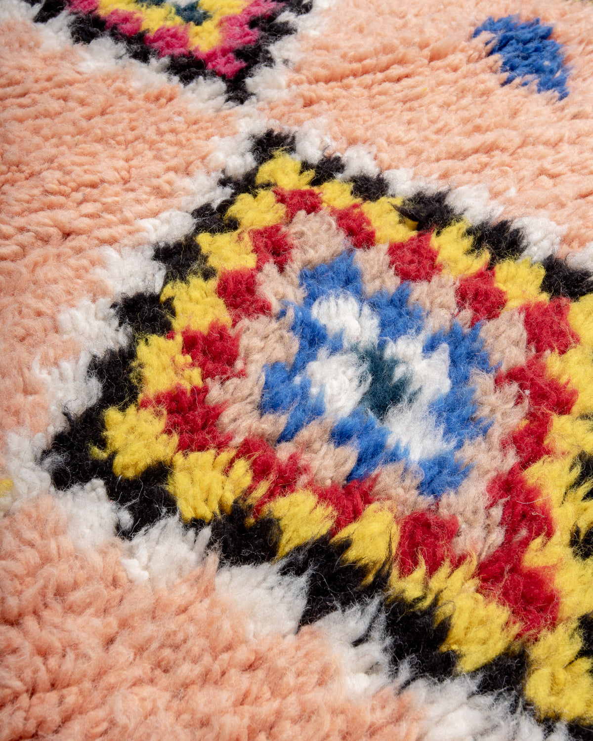 Modern, designer, handcrafted Berber runner rug from Morocco. Beniourain carpet with beautiful colours and patterns and fluffy wool texture.